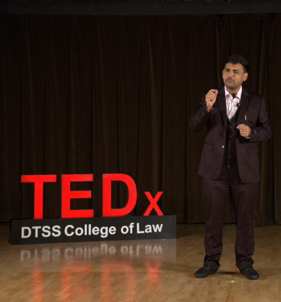 Mayur Soni delivering a TEDx talk at DTSS College of Law